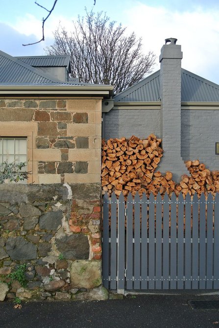 Historic buildings use a mixture of the local sandstone, bricks and corrugated iron for the roofs.