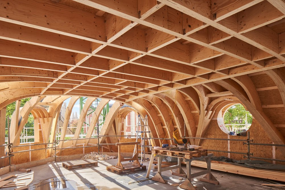 A prefabricated timber roof was chosen as a less risky – and lower carbon - option than the originally proposed concrete shell.