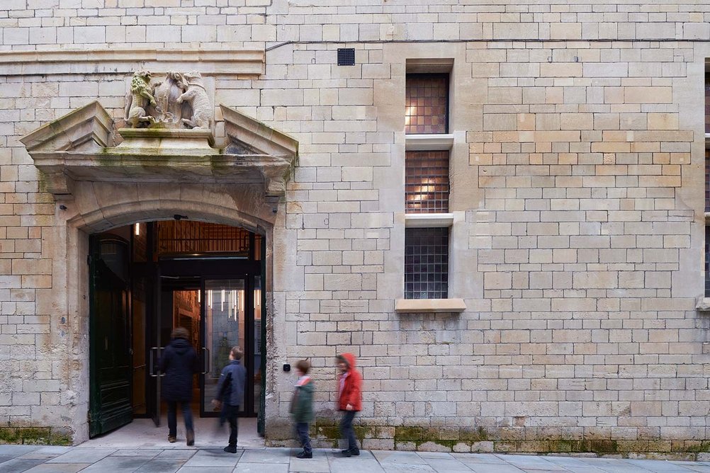 Down a side street, the boilerhouse doorway becomes the entrance to the learning centre.