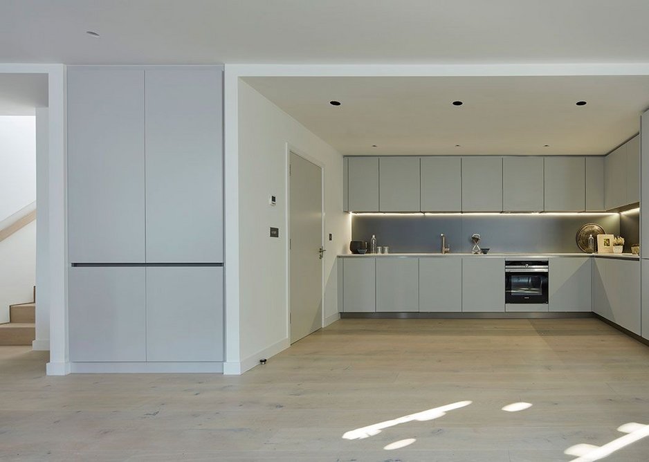 Each house has an open plan kitchen/living room on the ground floor. Photo: Dennis Gilbert. Courtesy HCL Architects.