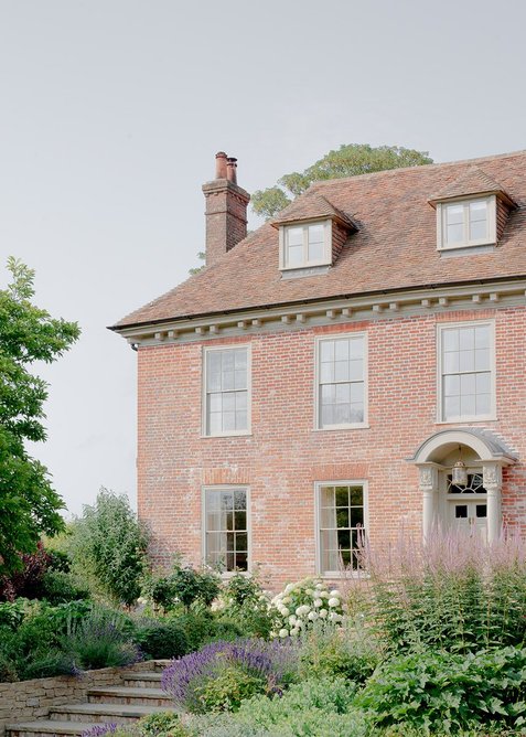 The 16th century main house is Grade II*-listed.