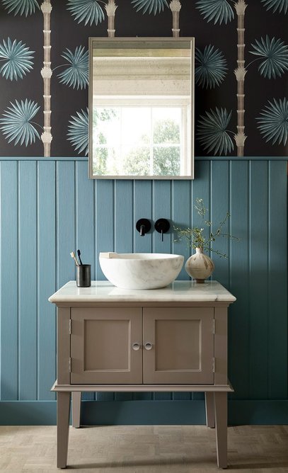 Bathroom wall in Hardy Palm - Perse Grey wallpaper. Panelling painted in Blue Gum 620; unit, Moleskin 218, both Architects' Satinwood, Paint & Paper Library.