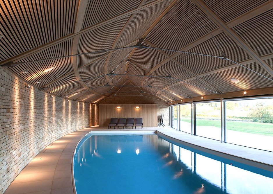 Private category – Contour House, Baslow, Derbyshire by Sanei Hopkins Architects. Timber structure, stone clad, it snakes along the hillside.