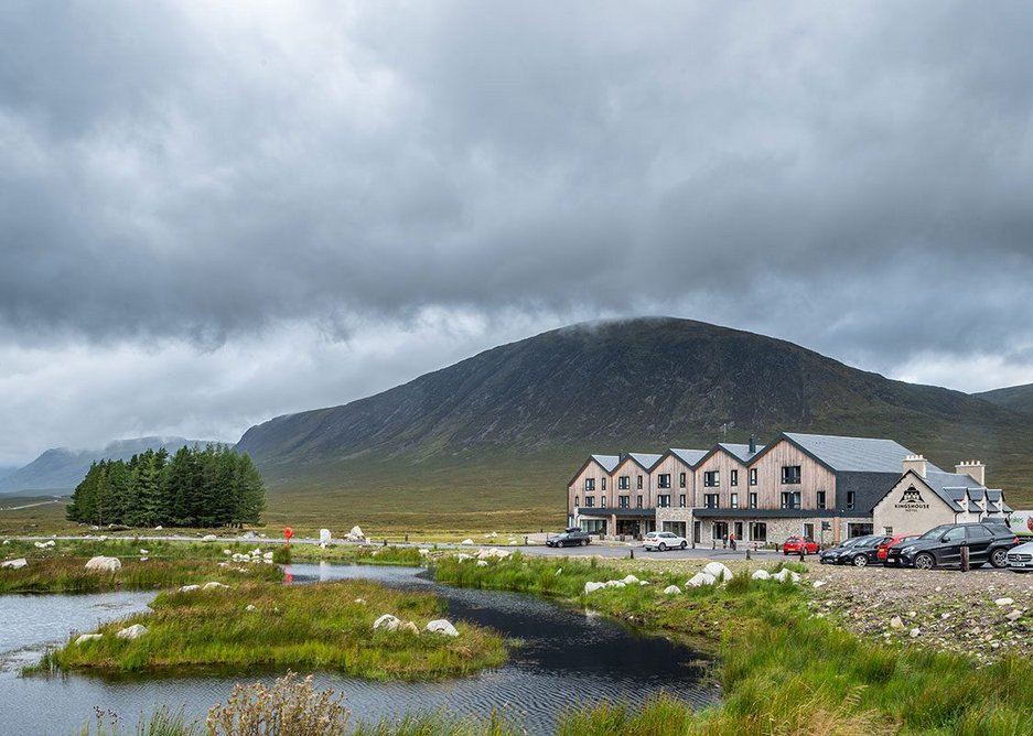 Perfect balance: natural materials and a roofline that complements the surrounding mountain range.