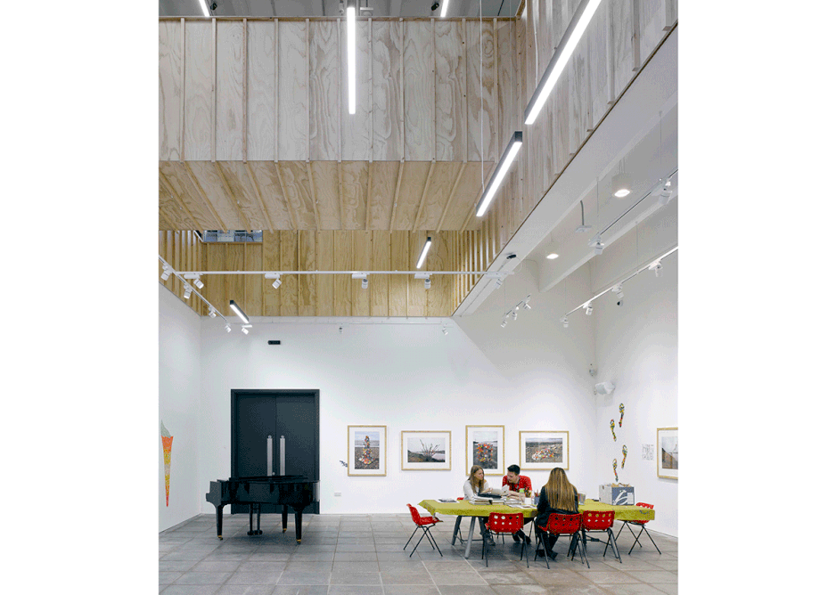 A gallery benefits from an impressive double-height space, overlooked by offices and studios.
