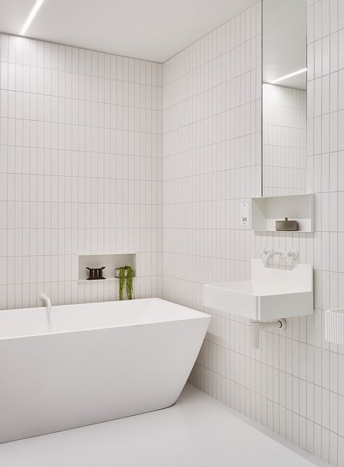 Attention to detail continues in the all-white matt bathrooms – the ultimate hygienic space.