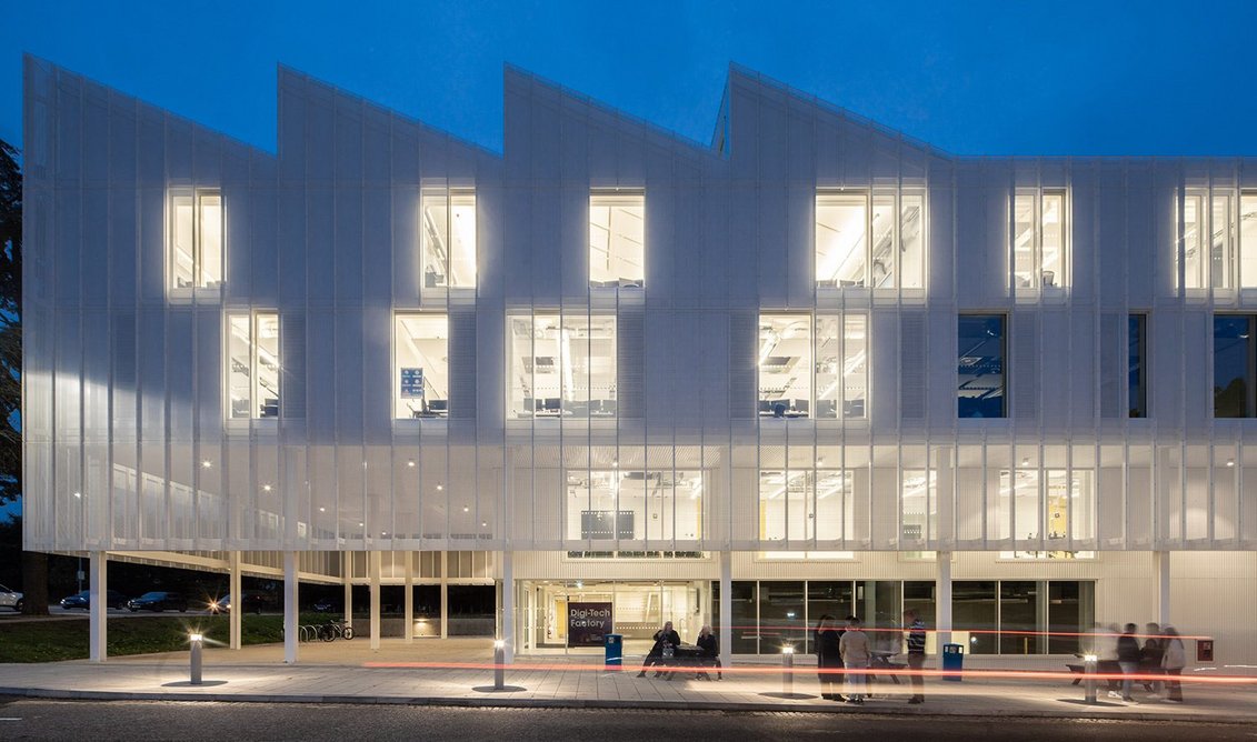 Night view of the Digi-Tech Factory for Norwich City College. Coffey Architects hoped to achieve an ambiguity of form with different effects at different times of day and night.