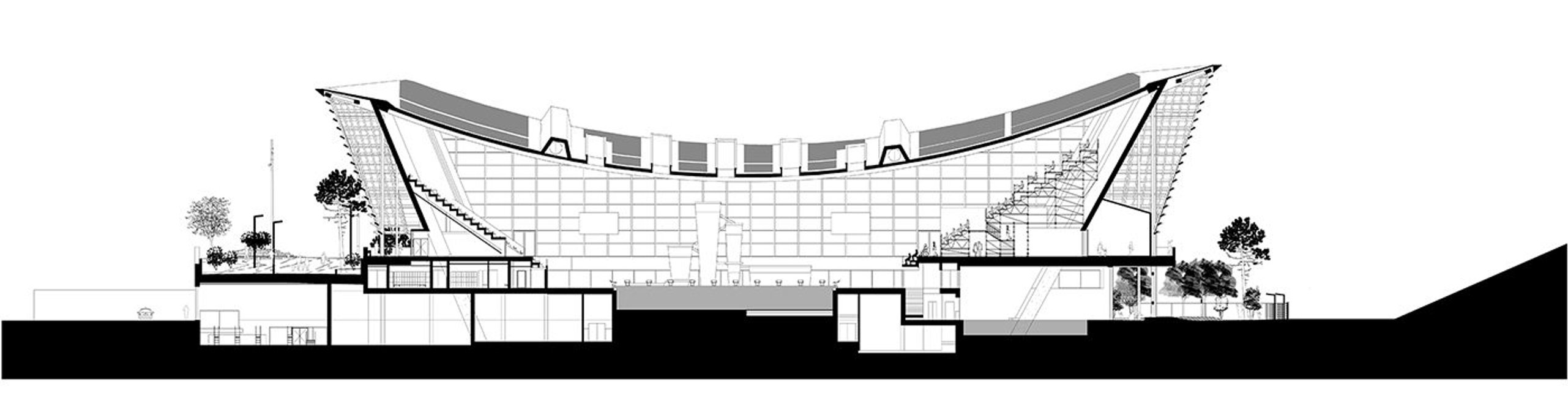 Cross section The slender, concave roof fits snugly over the pool hall to minimise the volume of air that needs to be conditioned.