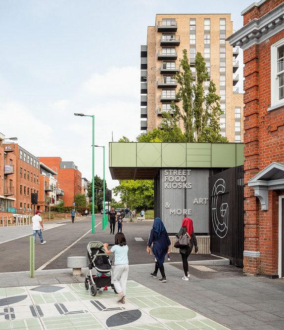 The ‘welcome mat’ and art kiosk both announce the market square to shoppers on Station Rd.