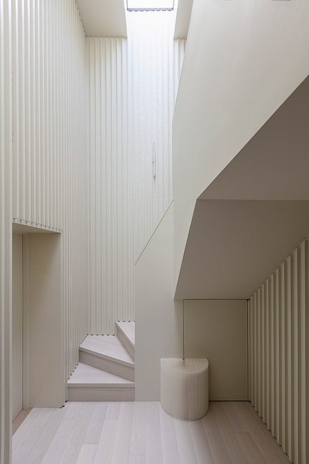 Toplight plays on the ribbed walls to aid navigation and create pockets of interest.