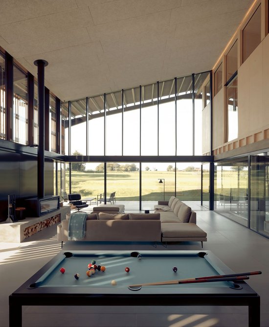 View from the kitchen island over the pool table and living room to the big skies.