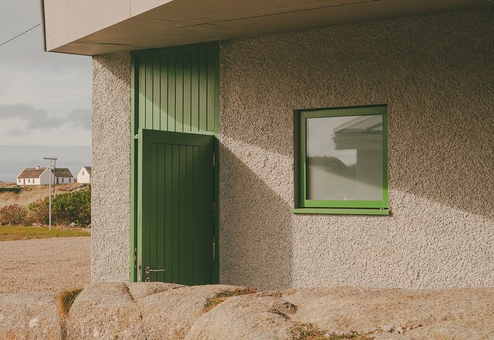 Green windows and doors speak to the island’s Marram grass and chasmophytes.