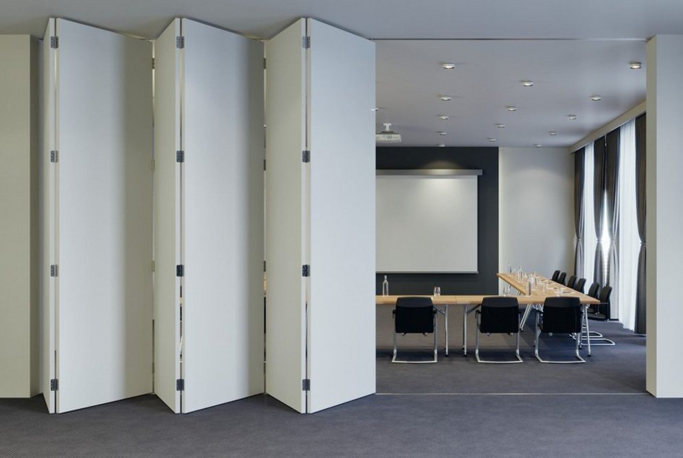 Slido 100T (Slido Fold 32) folding sliding door system: Flexible, transformable office spaces in an instant.