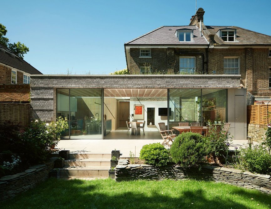 Garden view; new brickwork echoes the original house.