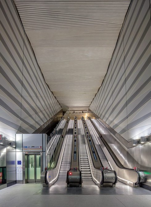 At the eastern end escalators are accompanied by funicular lifts (left).