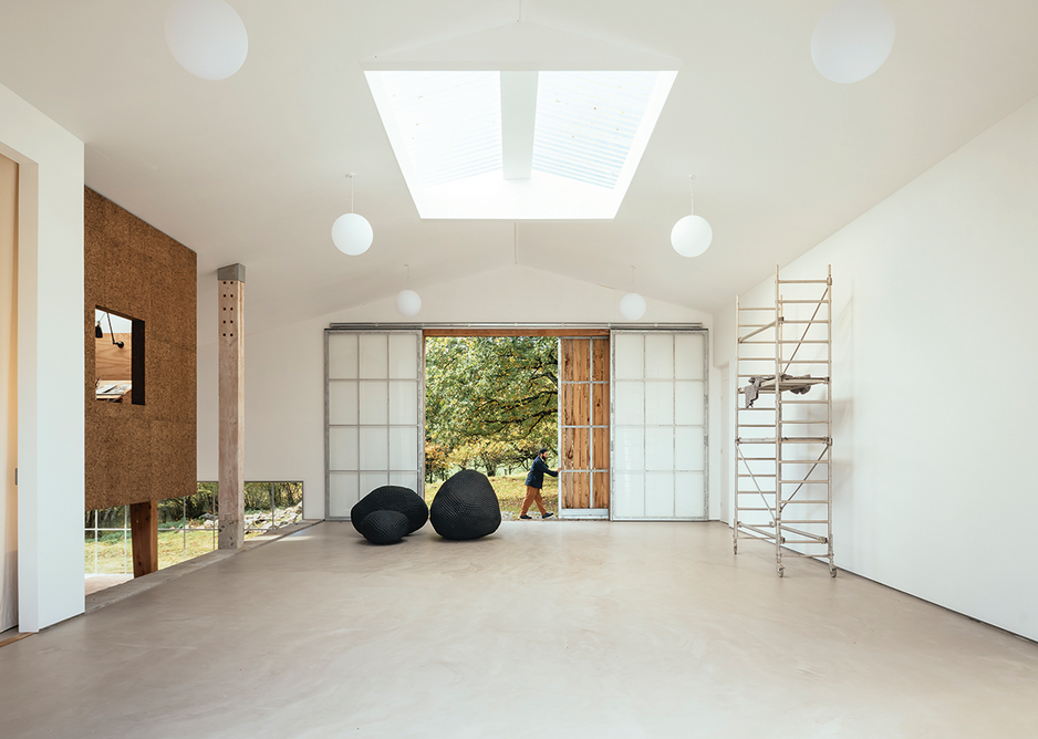 The cork-clad Winter Studio overlooks the toplit gallery.