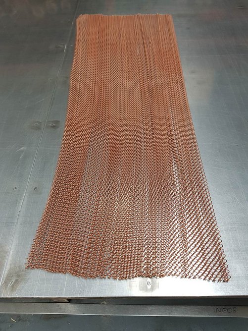 Fabrication of woven bronze mesh by architectural mesh specialists Locker Group, created for Coffey Architects’ Reuben Library at the British Film Institute.