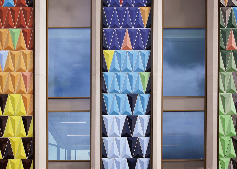 The colours and diagramatic certainty of the facade have been adopted by the theatre in graphics.