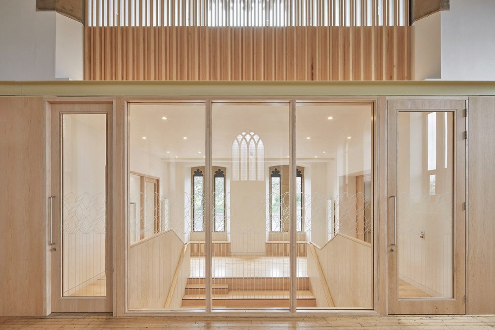 Glass doors, maple and plywood finishes help create a sense of light and space.