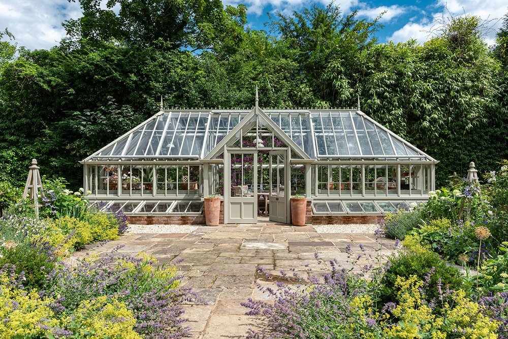 Alitex aluminium Messenger-style greenhouse with hipped ends.