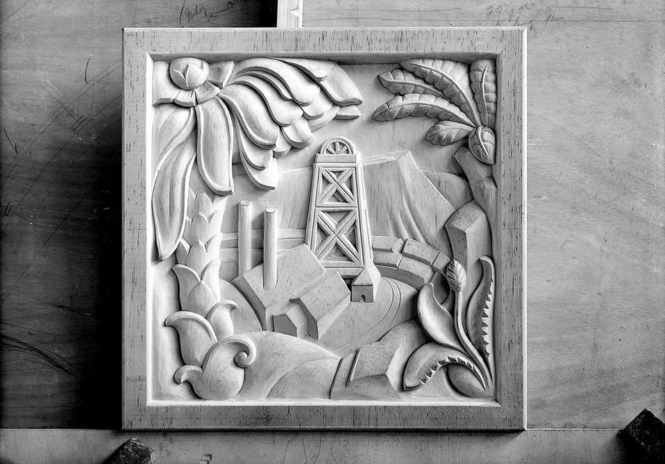 South African individual panel from the Dominion Screen, located in the Henry Florence Memorial Hall at the Royal Institute of British Architects, 66 Portland Place, London. The carved Quebec pine screen was designed by Denis Dunlop and executed by J. L. Green & Vardy Ltd, architectural joiners and cabinet makers.