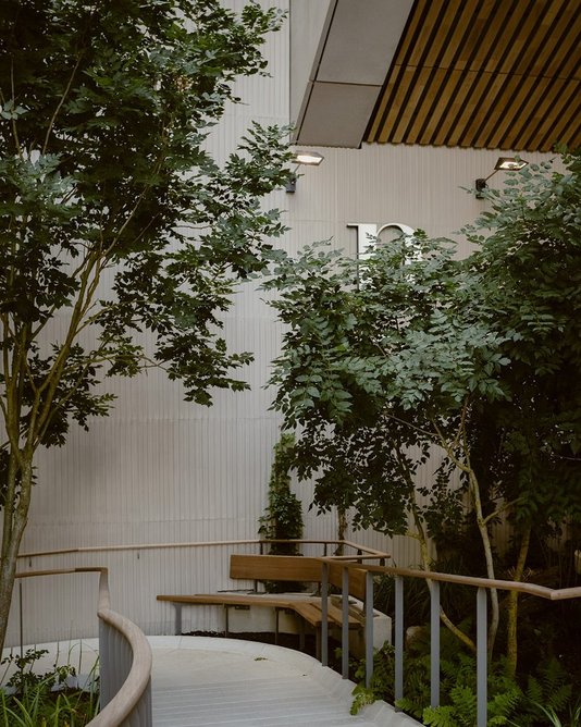 Ramp detail with bench at public realm designed by muf architecture/art for Lynch Architects’ N2 in Victoria, London. Photo: Rory Gaylor