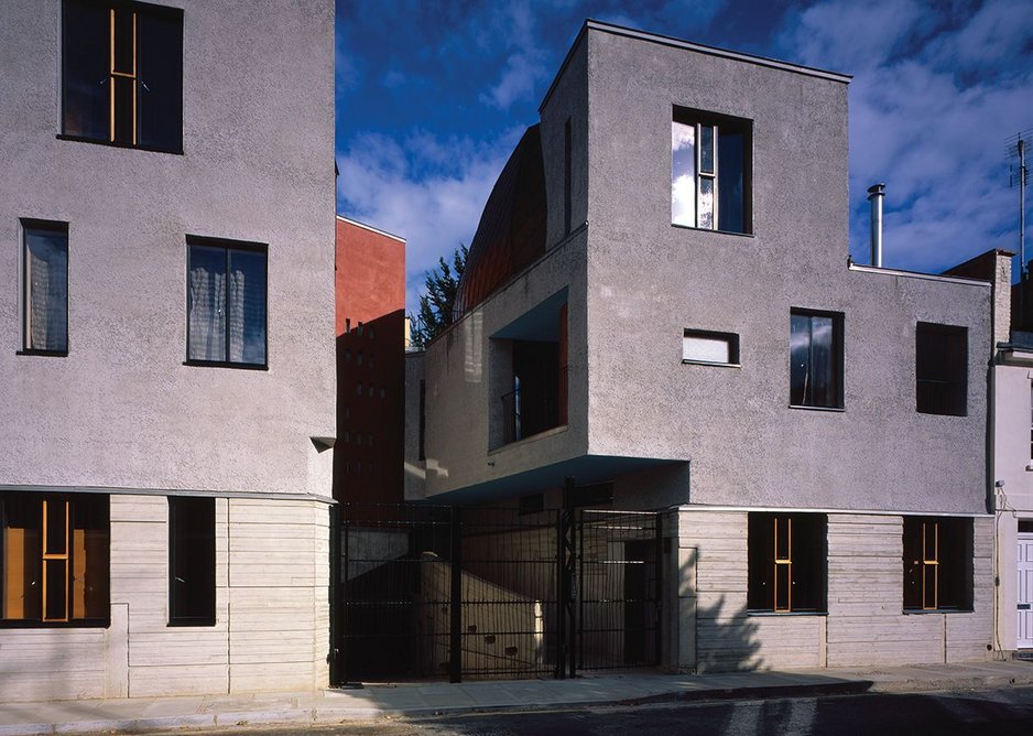 The west elevation and entrance; a hard face and ravine leading to the more visceral courtyard within.