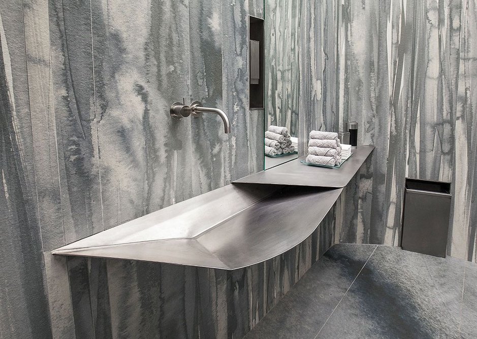 Washroom, with Neolith used on the wall and floor.