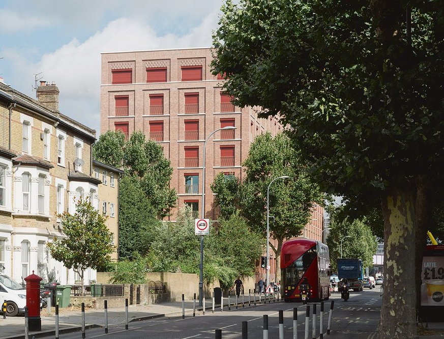 The site is tightly bound by a road, a railway viaduct and a Victorian terrace.