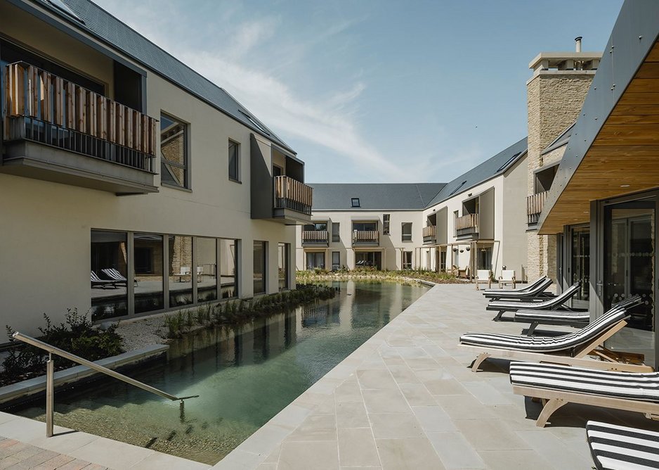 Residents lounge (right) and spa and gym (left) sit alongside the pool.