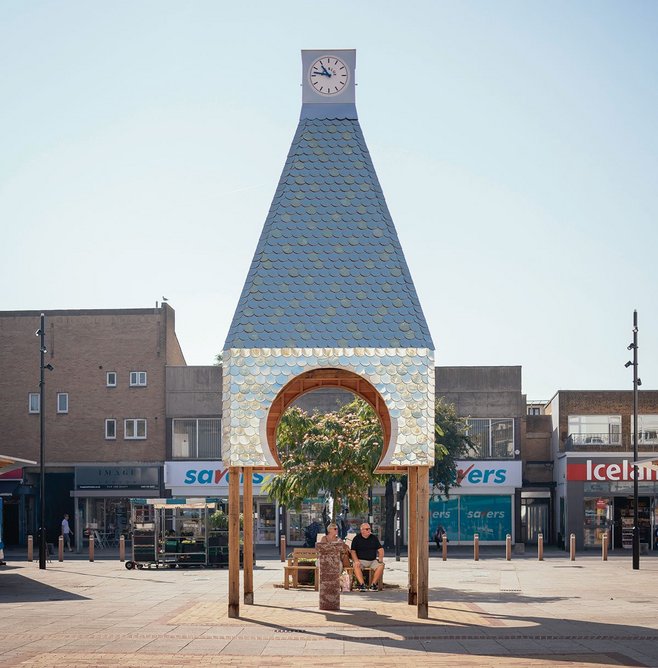 Hayatsu’s clock tower with public water fountain below- Blue Market is a collaboration with Assemble