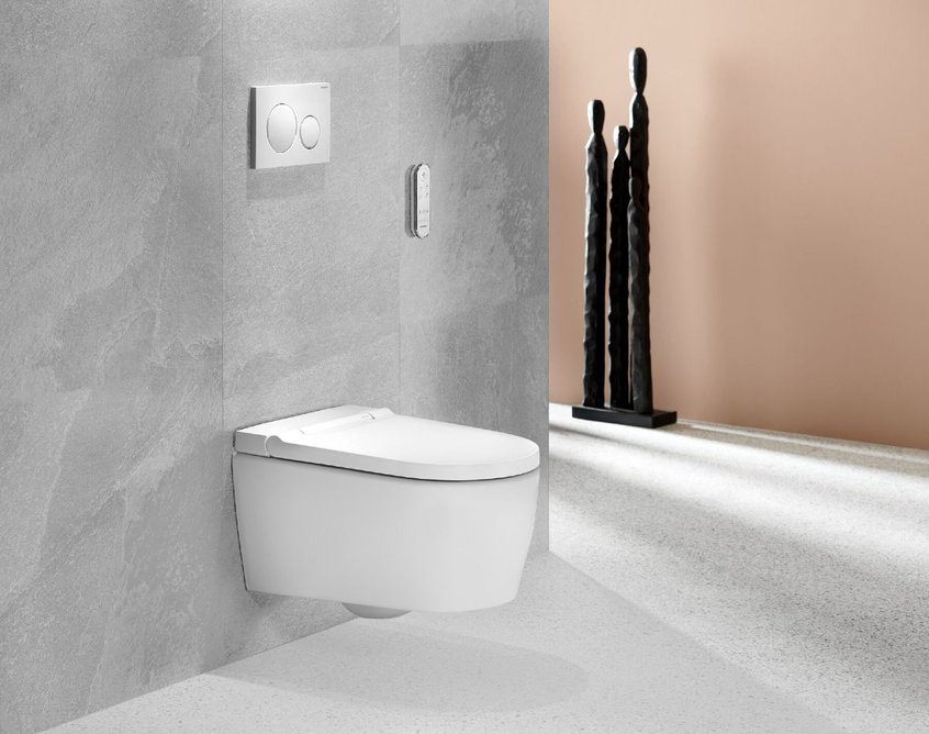 Geberit AquaClean Sela shower toilet in White Satin finish with Sigma20 flush plate in white/bright chrome.