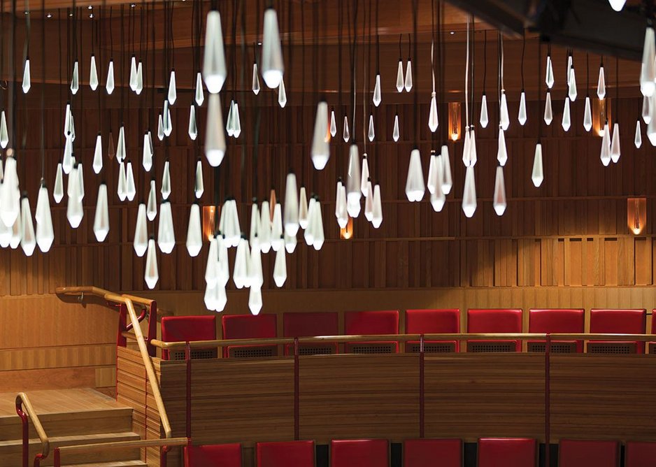 Pendants reference the historical use of candles to light theatres.