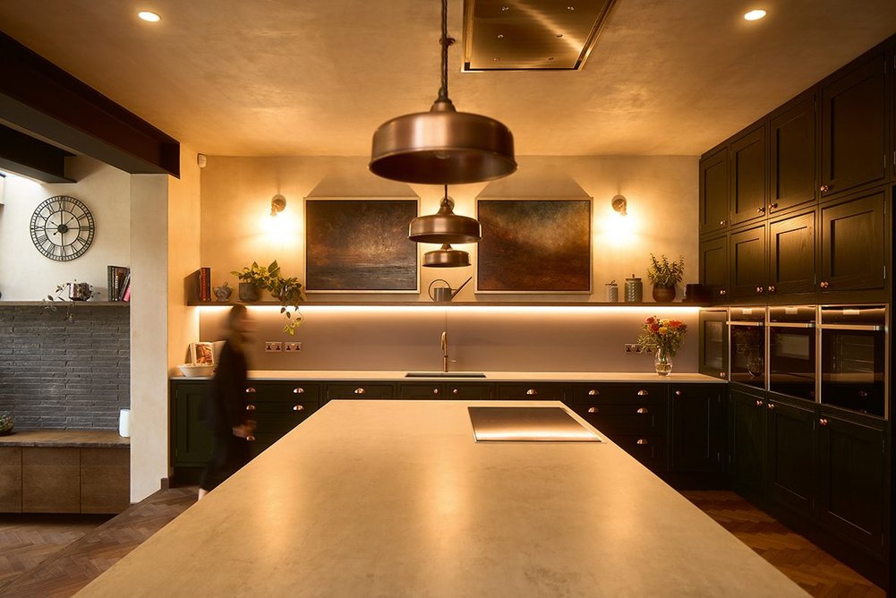 Generous work surfaces make this very much a kitchen for entertaining as well as cooking. Its qualities are filmic.