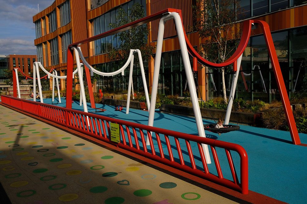 Bespoke steel swings are specifically tailored to meet UK play safety standards.