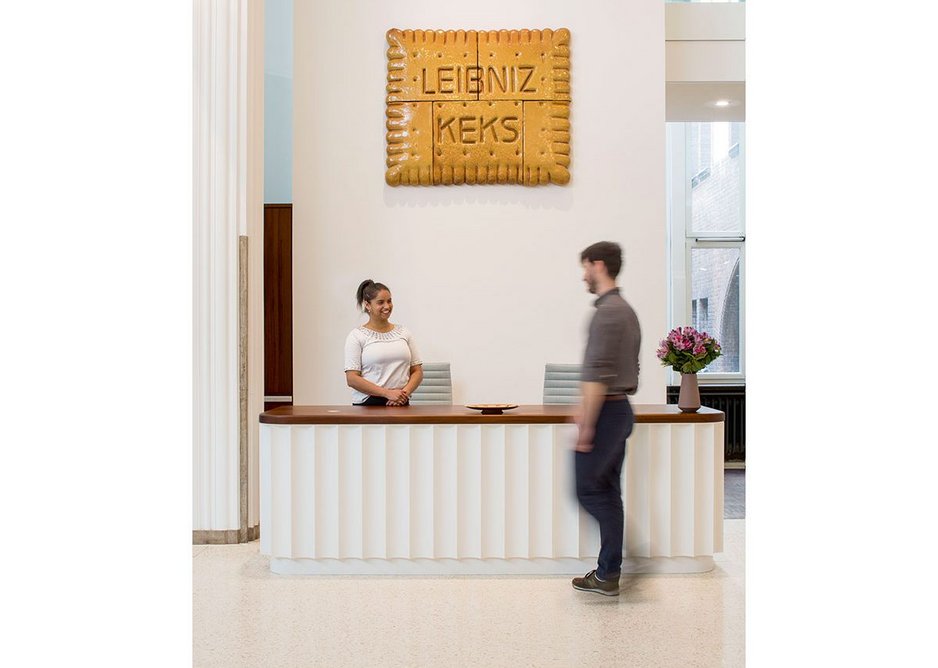 Freehaus’ reworked entrance hall at the Hanover factory and office of Bahlsen, the manufacturer of Choco Leibniz biscuits. The project refurbished the 1911 building and removed hard security, opening it up more to the public after decades of fear about corporate espionage.