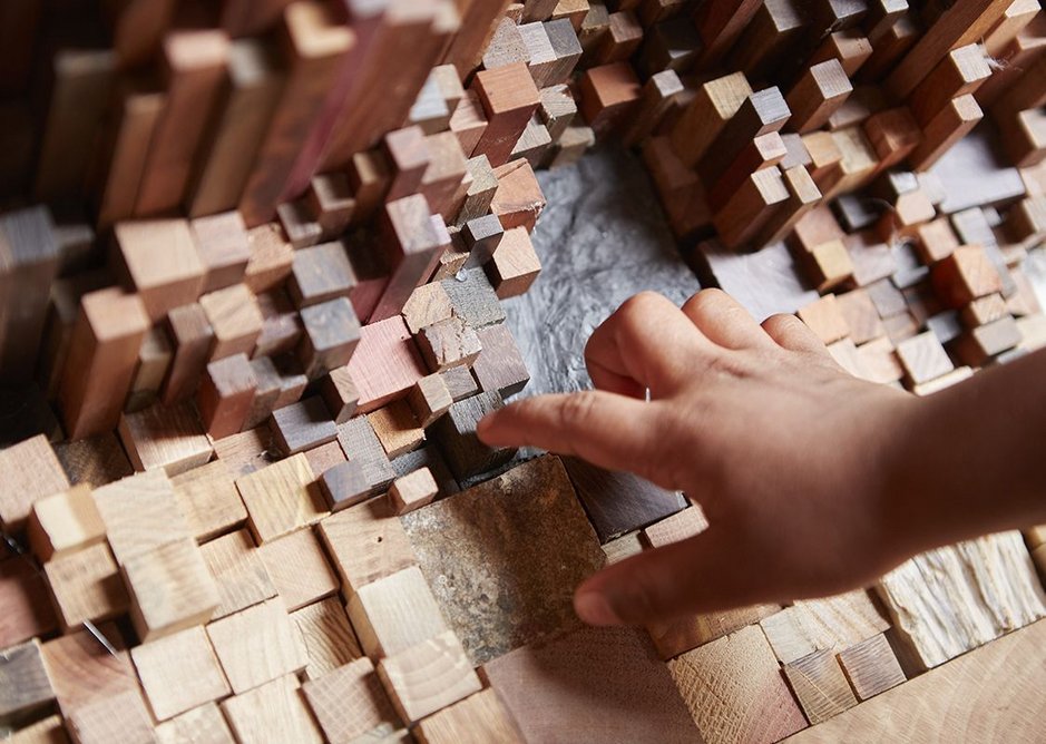 Detail of the untreated wood samples that make up the interior of Hollow, an installation.