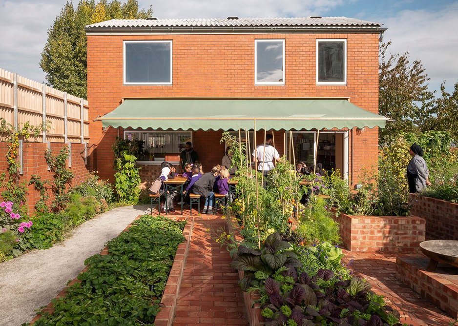 Productive gardens at Hackney School of Food designed by Surman Weston. Children can grow and pick produce and then cook it in the teaching kitchen.