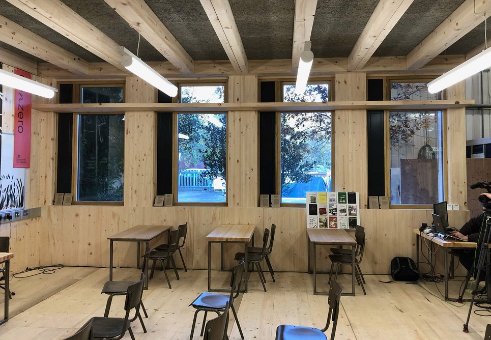 Prototype GenZero timber classroom built at a fringe event to COP26 at the Construction Scotland Innovation Centre in Glasgow. Designed by Lyall Bills & Young, the classroom has Glulam columns and beams and CLT panels. When built for permanent use, it will have a concrete-topped hybrid floor.