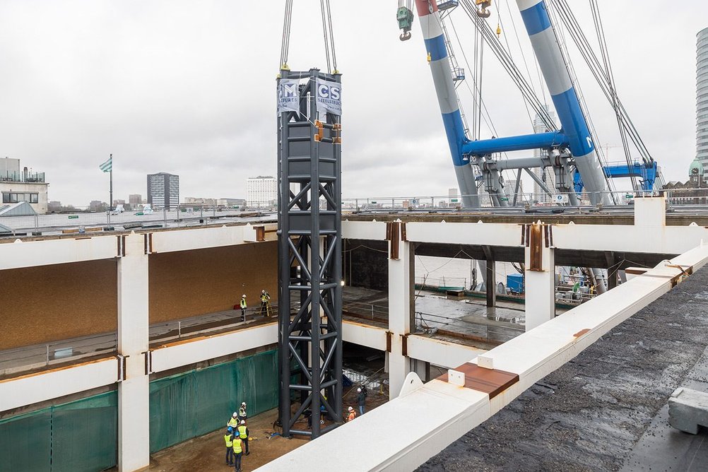 The lift shaft situated within the lobby’s new steel skeleton during installation.