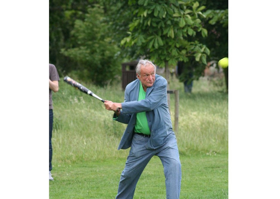 Richard Rogers playing softball.