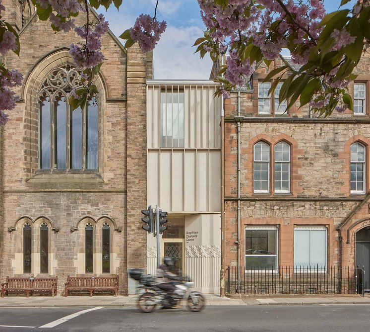 The west elevation onto Pleasance appears as a discreet section of cast terrazzo and Accoya wood.