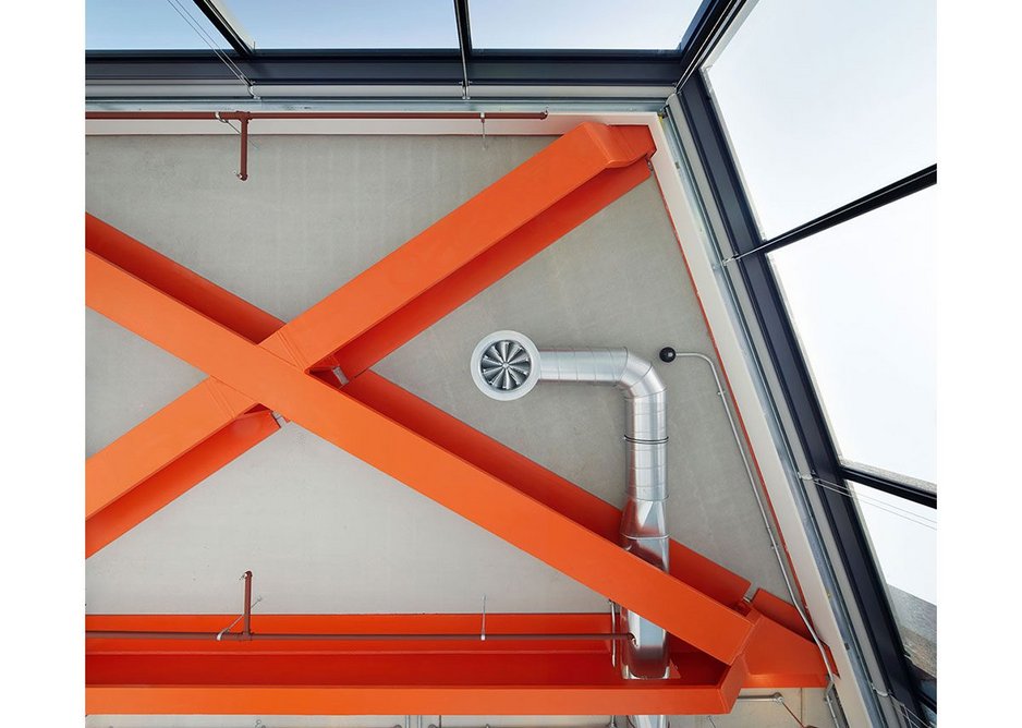 Corner cantilevers have their structure boldly highlighted in the Brunel Building’s signature orange. Services slip in neatly between.