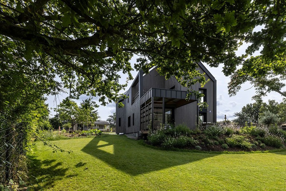 Timber cladding on the gable ends is a nod to the surrounding trees.