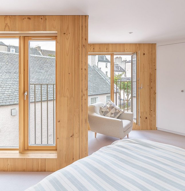 Bedroom with juliet balconies.