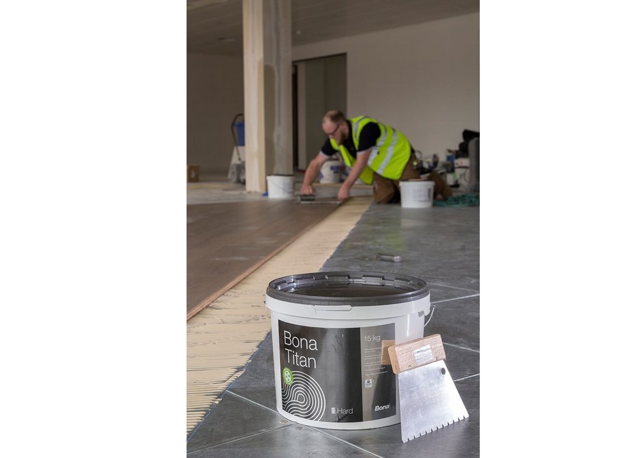 Bona Titan silane-based adhesive for wood floors.