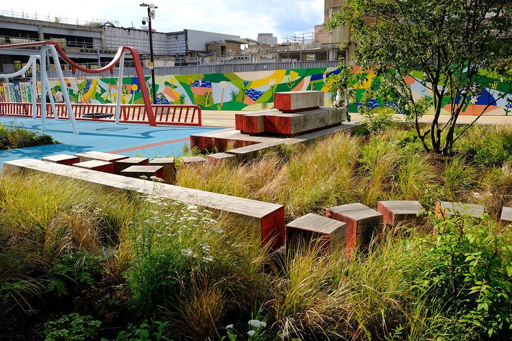 Bespoke play equipment, thoughtful design and seamless integration with the landscape have transformed the area into a vibrant space for relaxation and play.