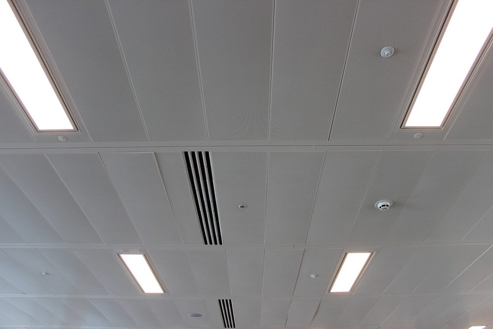 SAS ceiling tiles in-situ before being removed for refurbishment and reuse.