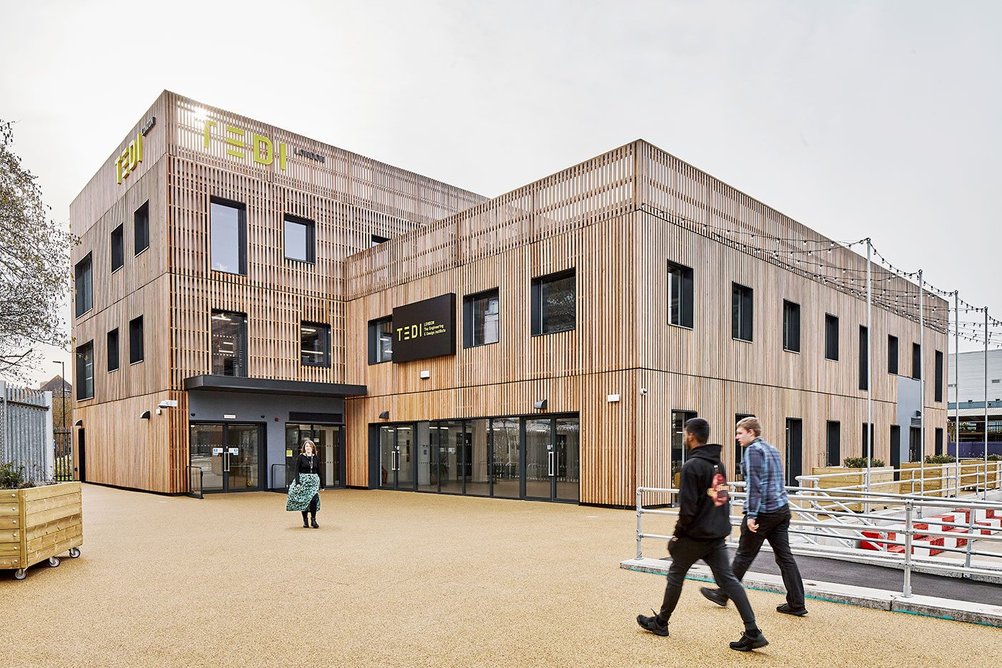 External view of completed TEDI with the modular units behind timber.