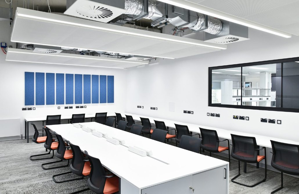Study room with OWA UK's OWAtecta S80 demountable rafts and OWAconsult FreeStyle wall absorbers.